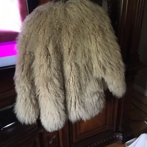 Vintage 1970s fur coat. Mongolian lamb fur